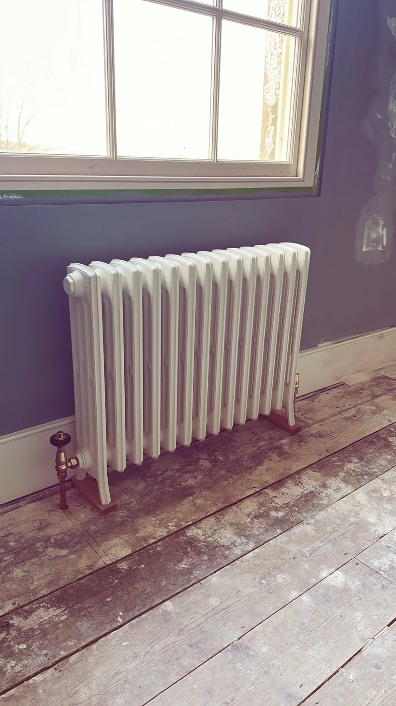 Traditional cast iron column radiator installed by Heritage Heating Services