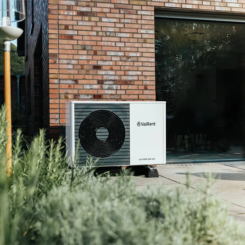Air source heat pump installed by Heritage Heating Services, showing our attention to pipework detail